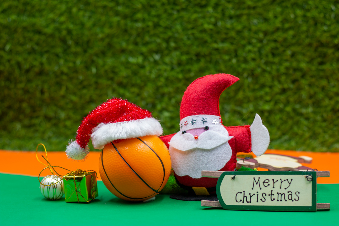 Basketball Christmas Holiday with Basketball and Santa hat on green